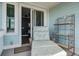Balcony with a lounge chair offering a sneak peak of the bedroom indoors at 1637 Folly Creek Way # E-12, Charleston, SC 29412