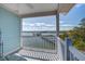 Balcony offers views of a pier and waterfront, perfect for outdoor relaxation at 1637 Folly Creek Way # E-12, Charleston, SC 29412