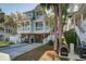 Inviting two-story beach house with double porches and beautiful landscaping at 1637 Folly Creek Way # E-12, Charleston, SC 29412