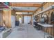 Bright and spacious garage featuring natural wood planking and plenty of room for storage and vehicles at 1637 Folly Creek Way # E-12, Charleston, SC 29412