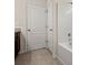 Bathroom showcasing a shower-tub combo and an attached storage closet at 168 Keaton Brook Dr, Summerville, SC 29485