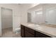 Bathroom showcasing a vanity and mirror, toilet, and an attached closet with wire shelving at 168 Keaton Brook Dr, Summerville, SC 29485