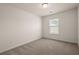 This bedroom features neutral walls, carpeted floors, and a window, creating a calm and inviting space at 168 Keaton Brook Dr, Summerville, SC 29485