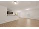Open-concept living room and kitchen with hardwood floors and abundant natural light at 168 Keaton Brook Dr, Summerville, SC 29485