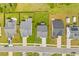 An aerial view of the properties, neighborhood, and their manicured lawns at 1728 Refuge Dr, Ladson, SC 29456