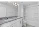Bathroom featuring double granite vanity, shower and separate bathtub at 1728 Refuge Dr, Ladson, SC 29456