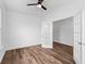 Bedroom with ceiling fan, hardwood floors and french doors to an adjacent room at 1728 Refuge Dr, Ladson, SC 29456