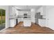 Modern kitchen featuring stainless steel appliances, granite counters, and white cabinets at 1728 Refuge Dr, Ladson, SC 29456