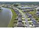 An aerial view of the neighborhood, showing the proximity to a pond and the street layout at 183 Greenwich Dr, Summerville, SC 29486
