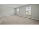 Bright bedroom with two windows and carpeted floor at 183 Greenwich Dr, Summerville, SC 29486