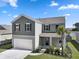 Charming two-story home featuring a two-car garage and beautifully landscaped front yard at 183 Greenwich Dr, Summerville, SC 29486