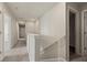 An upstairs hallway features carpet, white walls, several doors and overhead lighting at 183 Greenwich Dr, Summerville, SC 29486