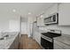 View of kitchen with stainless appliances, light gray cabinets and granite countertops at 183 Greenwich Dr, Summerville, SC 29486