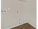 The laundry room features a laminate floor and multiple outlets for modern appliances at 183 Greenwich Dr, Summerville, SC 29486