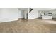 Spacious living room with hardwood floors and a view into the kitchen at 183 Greenwich Dr, Summerville, SC 29486