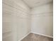 Spacious walk-in closet featuring white wire shelving for optimal organization and storage in the room at 183 Greenwich Dr, Summerville, SC 29486