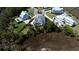 Panoramic aerial view capturing a residential neighborhood with waterfront homes, mature trees, and scenic marshland backdrop at 1905 Lone Oak Pt, Mount Pleasant, SC 29466