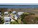 Stunning aerial view of waterfront homes with private docks, showcasing waterfront living and community layout at 1905 Lone Oak Pt, Mount Pleasant, SC 29466