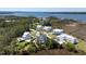 Beautiful aerial view highlighting the community's lush greenery, waterfront access, and serene setting at 1905 Lone Oak Pt, Mount Pleasant, SC 29466