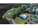 An aerial view shows the golf course, pool, playground, and various community amenities available to property owners at 1905 Lone Oak Pt, Mount Pleasant, SC 29466