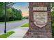 The Pointe Rivertowne Country Club sign set at the entrance with lush landscaping and appealing signage at 1905 Lone Oak Pt, Mount Pleasant, SC 29466