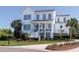Charming two-story home with landscaped yard, inviting front porch, and a classic white exterior with gray trim at 1905 Lone Oak Pt, Mount Pleasant, SC 29466