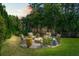 Outdoor fire pit area with comfortable seating perfect for entertaining or relaxing by the fire at 1905 Lone Oak Pt, Mount Pleasant, SC 29466