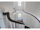 Overhead view of foyer showcasing a chandelier, winding staircase, and front door at 1905 Lone Oak Pt, Mount Pleasant, SC 29466