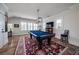 Spacious game room with a pool table, TV, and ample natural light, perfect for entertainment at 1905 Lone Oak Pt, Mount Pleasant, SC 29466