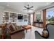 Comfortable living room featuring custom built-in shelving and plush seating at 1905 Lone Oak Pt, Mount Pleasant, SC 29466