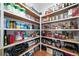 Well-stocked pantry with ample shelving, providing convenient storage space at 1905 Lone Oak Pt, Mount Pleasant, SC 29466