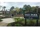A community playground with slides, climbing structures, and a shaded picnic area at 1905 Lone Oak Pt, Mount Pleasant, SC 29466