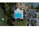 Aerial view of the community pool featuring recreational area, sunbathing deck, and multiple amenities at 1905 Lone Oak Pt, Mount Pleasant, SC 29466