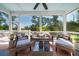 Inviting porch with comfortable seating, ceiling fan, and a view of the outdoors at 1905 Lone Oak Pt, Mount Pleasant, SC 29466