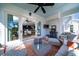 Relaxing porch with ceiling fan, stylish furniture, and open access to the house at 1905 Lone Oak Pt, Mount Pleasant, SC 29466
