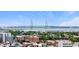 Expansive aerial view capturing the cityscape, waterfront, and a prominent bridge in the distance at 197 Coming St, Charleston, SC 29403