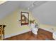 Bathroom with a sloped ceiling, toilet, and plants for a refreshing and functional space at 197 Coming St, Charleston, SC 29403