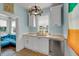 Charming kitchen featuring white cabinets, stone countertops, and stainless steel Viking appliances at 197 Coming St, Charleston, SC 29403