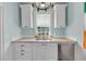 Charming kitchen featuring white cabinets, stone countertops, and stainless steel Viking appliances at 197 Coming St, Charleston, SC 29403