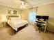 Cozy bedroom features a ceiling fan and a work-from-home setup at 2040 Rondo St # H, Charleston, SC 29414