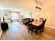 Open-concept living and dining area with stylish furnishings and ample natural light at 2040 Rondo St # H, Charleston, SC 29414