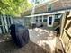 Backyard brick patio featuring a grill and a view of the home's exterior at 2040 Rondo St # H, Charleston, SC 29414