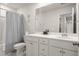 Well-lit bathroom with a double sink vanity, modern fixtures, and a shower-tub combination at 206 Red Bluff St, Summerville, SC 29483