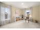 Bright office with large windows, shelving, and dedicated workspace, perfect for remote work or studying at 206 Red Bluff St, Summerville, SC 29483