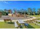 Community playground with a wooden ship structure, picnic tables, and benches at 206 Red Bluff St, Summerville, SC 29483