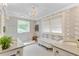 Luxurious bathroom with double vanity, elegant soaking tub, and walk-in shower at 207 Central Ave, Summerville, SC 29483