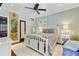 Comfortable bedroom with decorative ceiling, stylish bed frame and lots of natural light at 207 Central Ave, Summerville, SC 29483