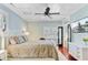 Bright bedroom with hardwood floors, recessed ceiling, television and large windows at 207 Central Ave, Summerville, SC 29483
