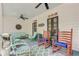 Spacious front porch with rocking chairs, lounge seating, and charming decor at 207 Central Ave, Summerville, SC 29483