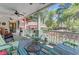 Open air porch with outdoor furniture and a view of the backyard and landscaping at 207 Central Ave, Summerville, SC 29483